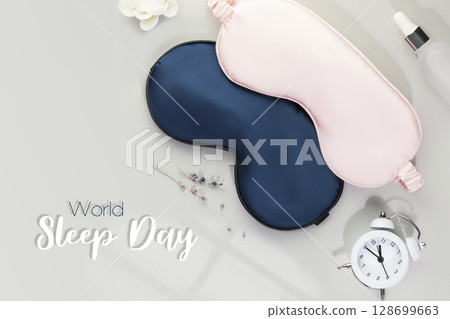 World sleep day card with masks for sleep, alarm clock with time for sleep and lavender flowers on a grey background with inscription World Sleep Day World sleep day card with masks for sleep, alarm clock with time for sleep and lavender flowers on a grey background with inscription World Sleep Day 128699663