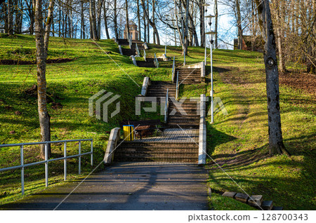 Modern multilevel stone staircase in the park 128700343