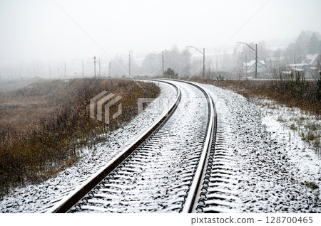 Winter landscape. Railway on a frosty morning 128700465