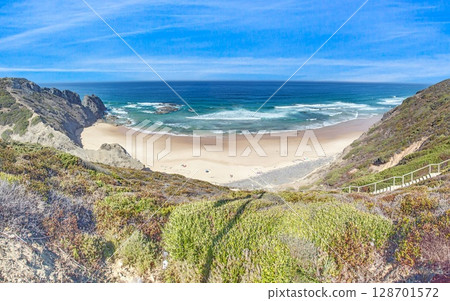 Bordeira beach with cliffs and surf Portugal 128701572