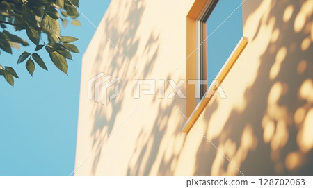 White facade of modern building and tree shadow wall when sun bright 128702063