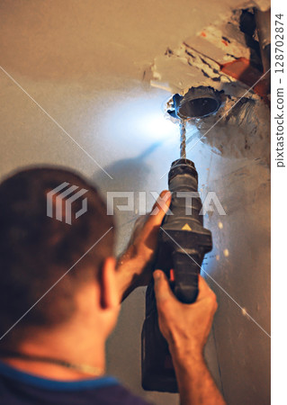 Mechanical man hand working fix electric drill motor roter fix repair shop Mechanical man hand working fix electric drill motor roter fix repair shop 128702874