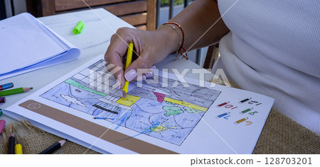 Close up coloring with pencils Close up coloring with pencils 128703201