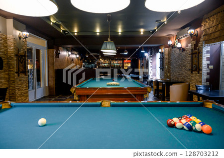 Billiard Table with balls and cue 128703212