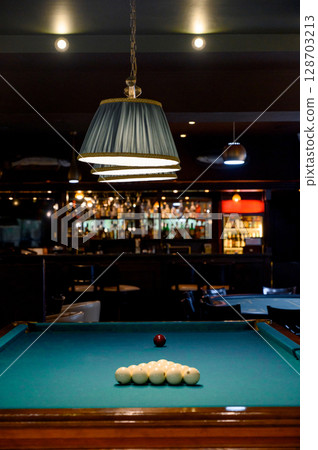 Billiard Table with balls and cue Billiard Table with balls and cue 128703213