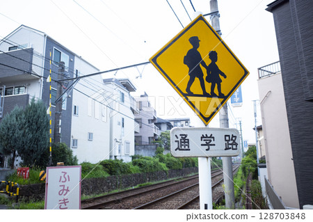 School route sign near a railroad crossing School route sign near a railroad crossing 128703848