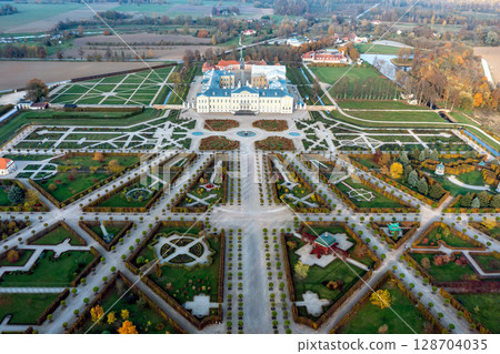 Aerial view on baroque garden of Rundale palace in autumn time. Symmetrical park in vibrant colors Aerial view on baroque garden of Rundale palace in autumn time. Symmetrical park in vibrant colors 128704035