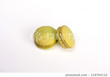 macarons, confectionery sweet product, green macarons isolated on white background macarons, confectionery sweet product, green macarons isolated on white background 128704110