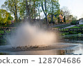 Fountain in the evening sunlight in Kuld?ga city park, Latvia 128704686