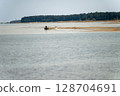 Fishing boat on the shore of the Baltic Sea, Latvia 128704691