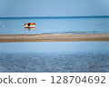 Fishing boat on the shore of the Baltic Sea, Latvia 128704692