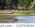 Fishing boat on the shore of the Baltic Sea, Latvia 128704694
