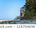 The old fishermen's lighthouse on Ragaciema beach, built in 1875, destroyed during the war 128704696