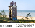 The old fishermen's lighthouse on Ragaciema beach, built in 1875, destroyed during the war 128704697