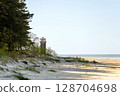 The old fishermen's lighthouse on Ragaciema beach, built in 1875, destroyed during the war 128704698