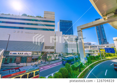 Yokohama cityscape in Japan. View of the east exit of Yokohama Station (center), Yokohama Bayside Blue, red shoes, and other things. 128704819
