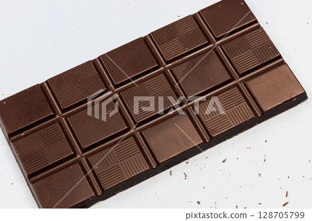 Delicious dark chocolate bar. Healthy eating concept Delicious dark chocolate bar. Healthy eating concept 128705799