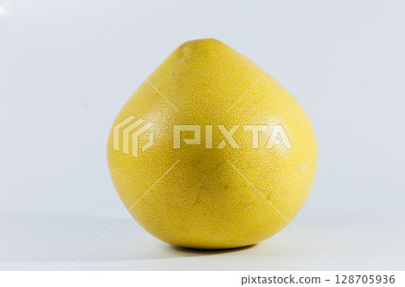 Pomelo fruit isolated on white background, tropical exotic citrus fruit Pomelo fruit isolated on white background, tropical exotic citrus fruit 128705936