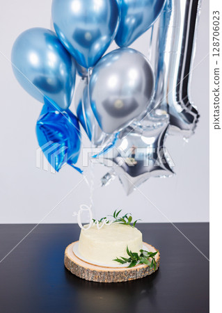 Beautiful delicious birthday cake with white and pink cream. Fresh dessert biscuit Beautiful delicious birthday cake with white and pink cream. Fresh dessert biscuit 128706023
