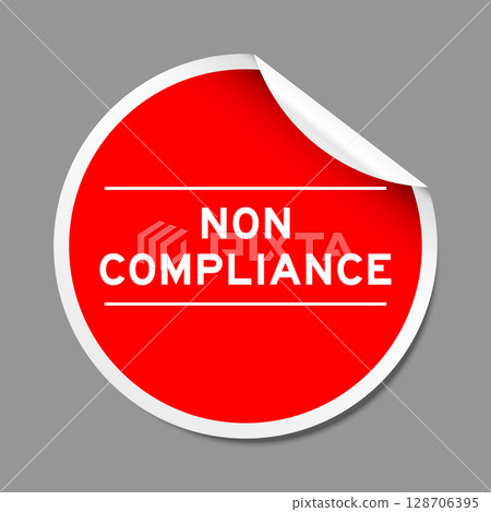 Red color peel sticker label with word non compliance on gray background Red color peel sticker label with word non compliance on gray background 128706395
