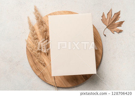 Blank invitation card template with dry plants Blank invitation card template with dry plants 128706420