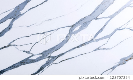 Statuario marble surface with refined grey veining, white luxury stone closeup texture, high-resolution elegant background for interior and architectural projects Statuario marble surface with refined grey veining, white luxury stone closeup texture, high-resolution elegant background for interior and architectural projects 128707254