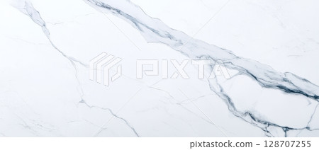 Diagonal veined Statuario marble slab background with elegant grey streaks for modern luxury interior design and architecture Diagonal veined Statuario marble slab background with elegant grey streaks for modern luxury interior design and architecture 128707255