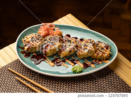 Hot fried sushi roll Hot fried sushi roll 128707893