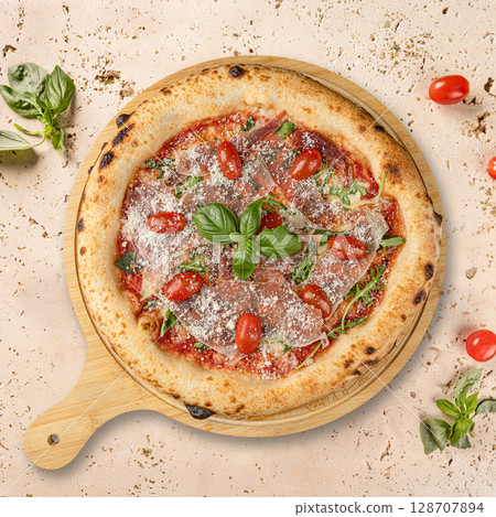 Delicious pizza with parma ham Delicious pizza with parma ham 128707894