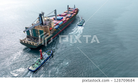 Aerial view from drone, Container ship or cargo shipping business logistic import and export freight transportation by container ship in open sea, Container loading cargo freight ship boat. Aerial view from drone, Container ship or cargo shipping business logistic import and export freight transportation by container ship in open sea, Container loading cargo freight ship boat. 128709684