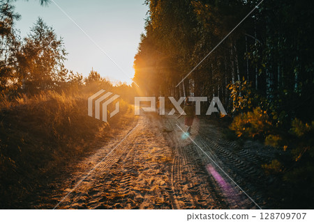 Cute kids, boys runs at summer nature road. Brothers, playing outdoors. Sunset 128709707