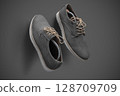 Stylish Gray Suede Casual Shoes with Beige Laces on Gray Background 128709709