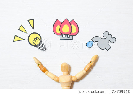 A drawing doll showing utility bills 128709948