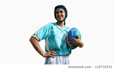 Woman rugby player holding ball and wearing protective gear, isolated on white 128710552