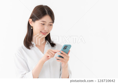 Woman, smartphone, smile Woman, smartphone, smile 128710642