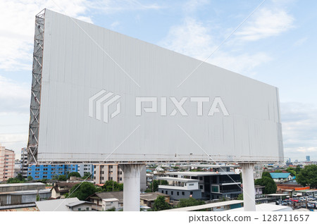 Large blank outdoor billboard in downtown area 128711657