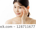 Young woman worried about eye problems (white background) 128711677