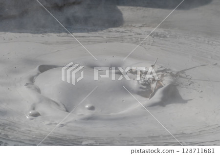 Beppu Bozu Jigoku: A geothermal scene of mud spewing out 128711681