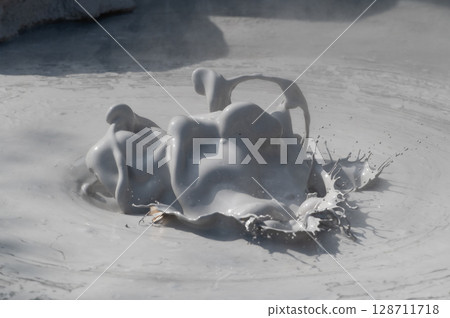Beppu Bozu Jigoku: A geothermal scene of mud spewing out 128711718