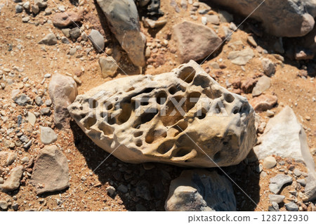 Close-up of a natural quartz formation inside a cave. The detailed crystal structure and layers of the mineral 128712930