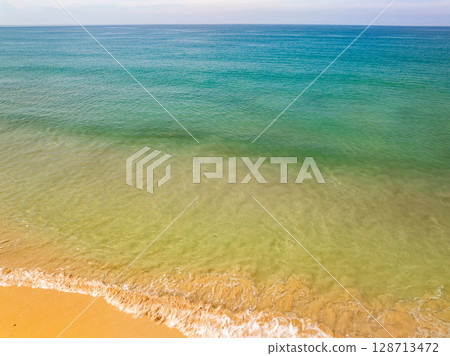 Top view Beach sand in summer season. Top view Beach sand in summer season. 128713472