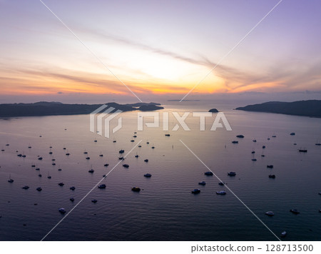 Drone view colorful sunset or sunrise sky over sea. 128713500