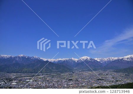 Omachi city and the Northern Alps as seen from Mount Takagari Omachi city and the Northern Alps as seen from Mount Takagari 128713946
