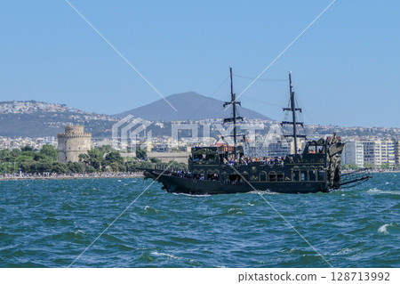 Thessaloniki, Greece, Pirate ship for tourists in front of the White Tower. 128713992