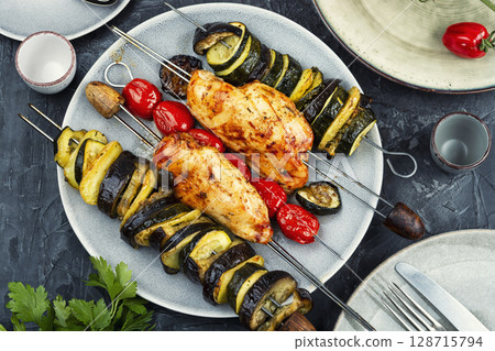 Grilled chicken skewers. Grilled chicken skewers. 128715794