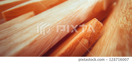 Natural light wood texture provides a warm and rustic backdrop ideal for crafts or design. Natural light wood texture provides a warm and rustic backdrop ideal for crafts or design. 128716007