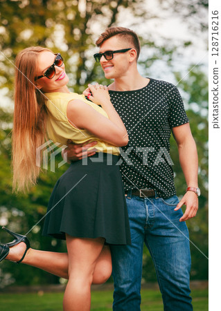 Happy couple in park 128716216