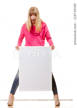 woman holding blank presentation board woman holding blank presentation board 128716500