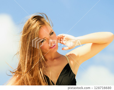 Happy woman beach holiday Happy woman beach holiday 128716680