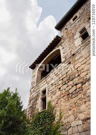 Facade of a 15th century Templar country house Facade of a 15th century Templar country house 128716850